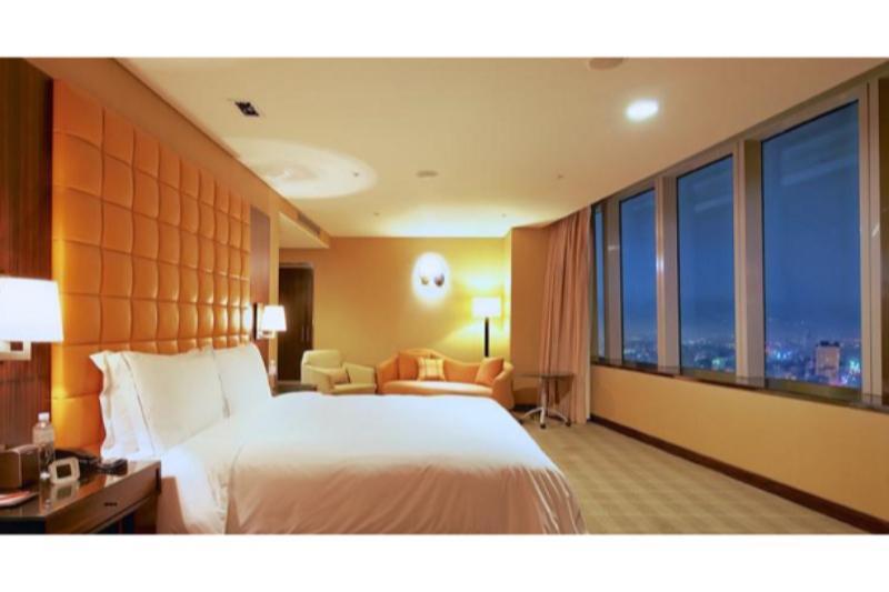 The Landis Taichung Hotel Exterior foto A bedroom at the hotel
